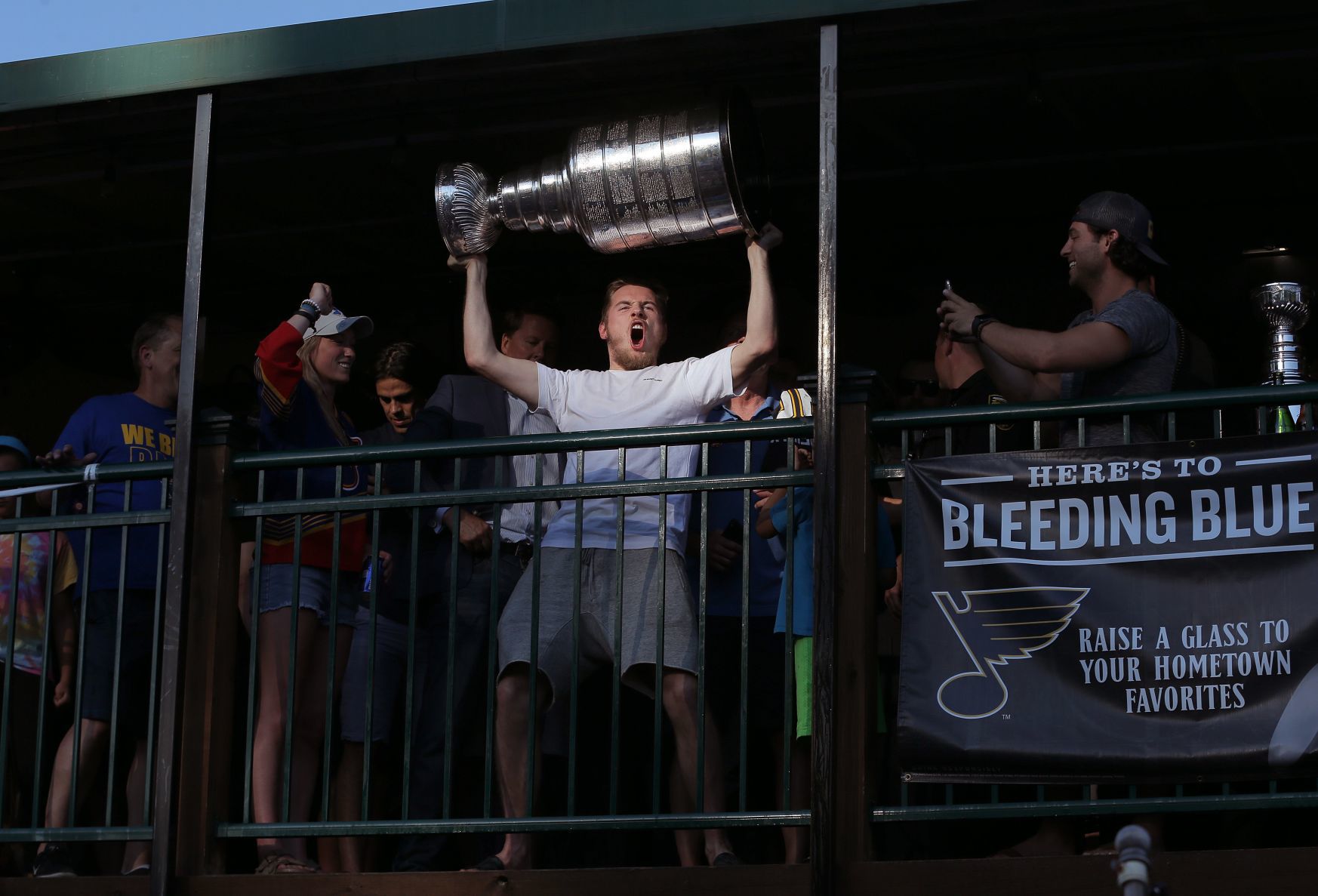 Blues celebrate at O.B. Clark's as fans celebrate with them